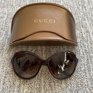 Gucci sunglasses with bamboo details.